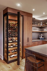 The Wine Square CAVEA single door glass wine cellar installed in modern living space